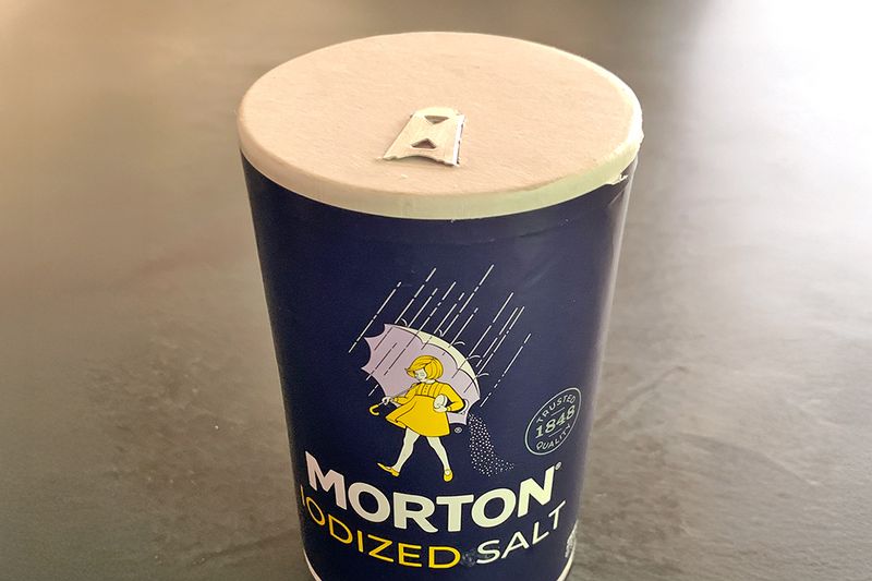 A 26-ounce container of Morton table salt.