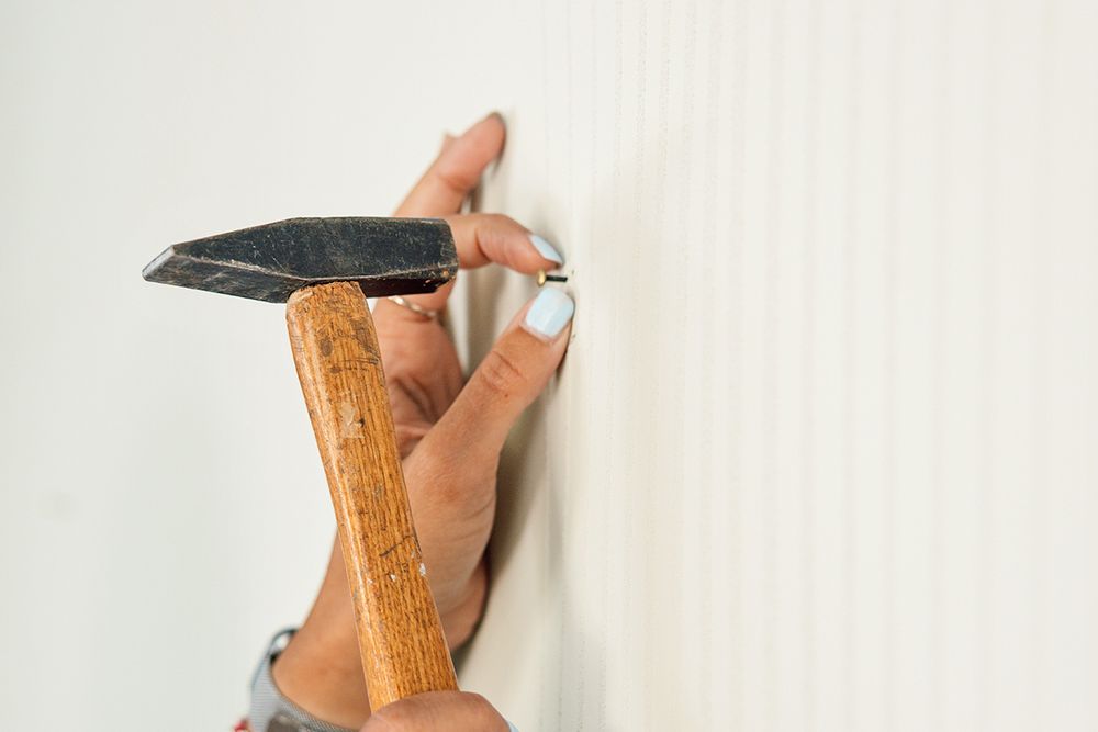3 No-Spackle Tricks To Erase Nail Holes in Seconds