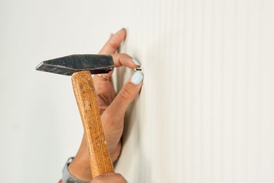 3 No-Spackle Tricks To Erase Nail Holes in Seconds