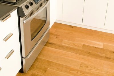 How To Clean Under Your Oven Without Pulling It Out