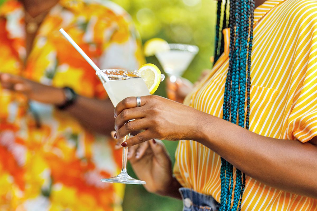 Woman holding margarita