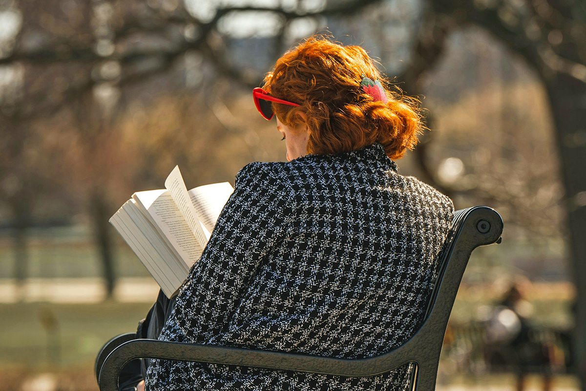 Woman reading on a bench