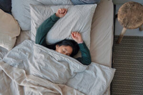 Woman sleeping in bed