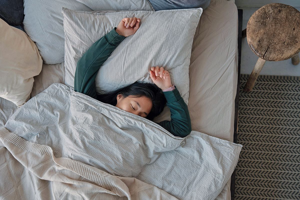 Woman sleeping in bed