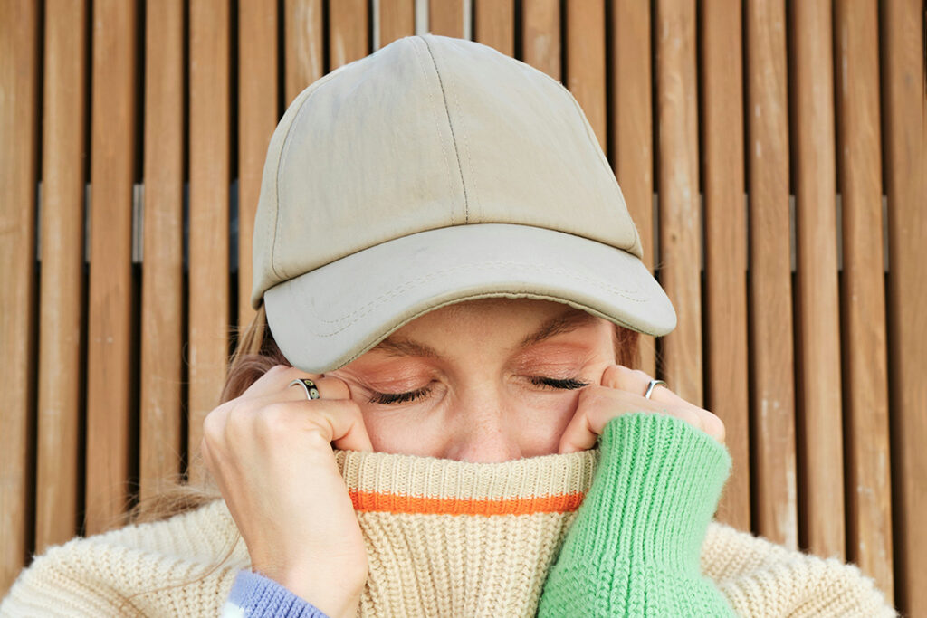 Woman in baseball cap