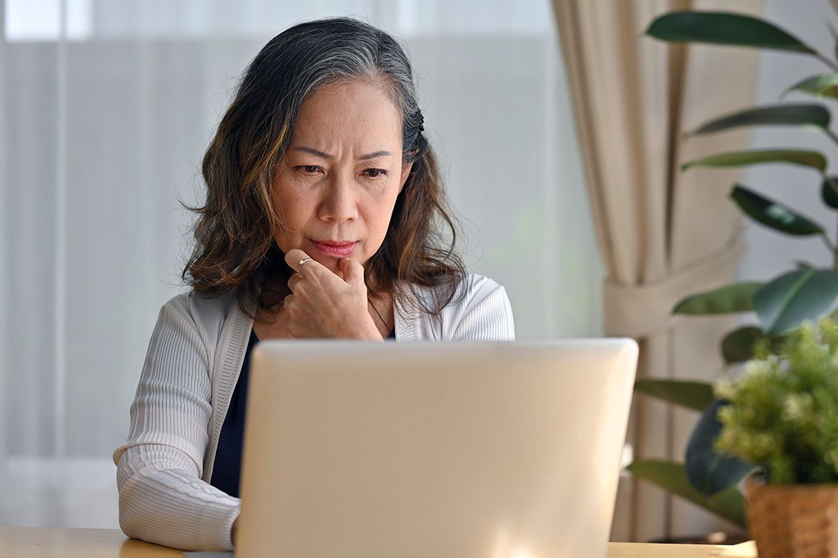Older woman looking at computer