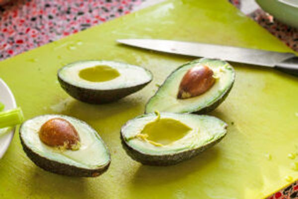 Avocados on cutting board