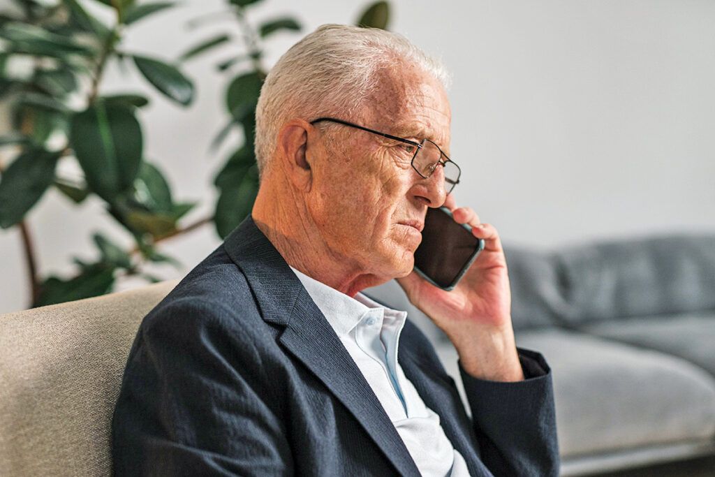 Older man on cell phone