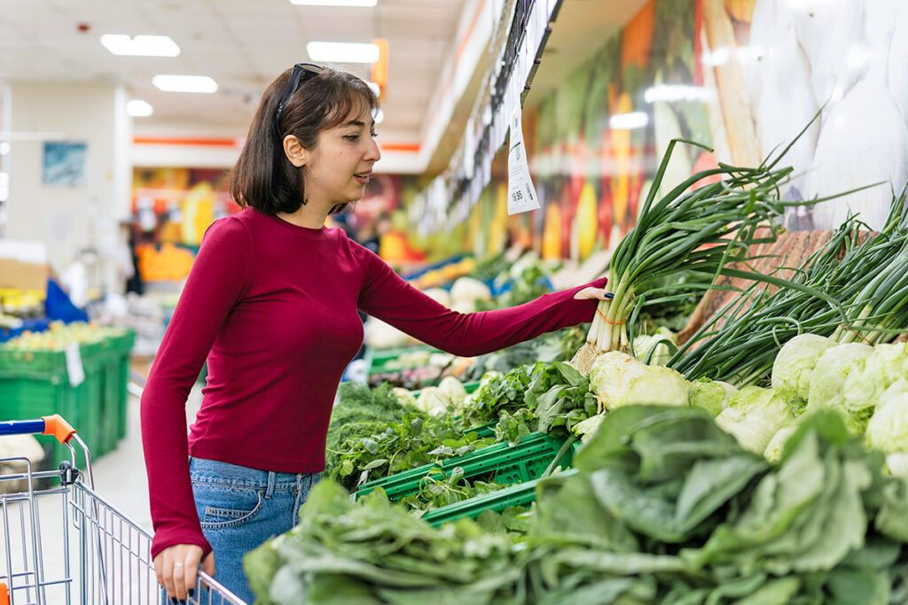 Woman shopping for produce