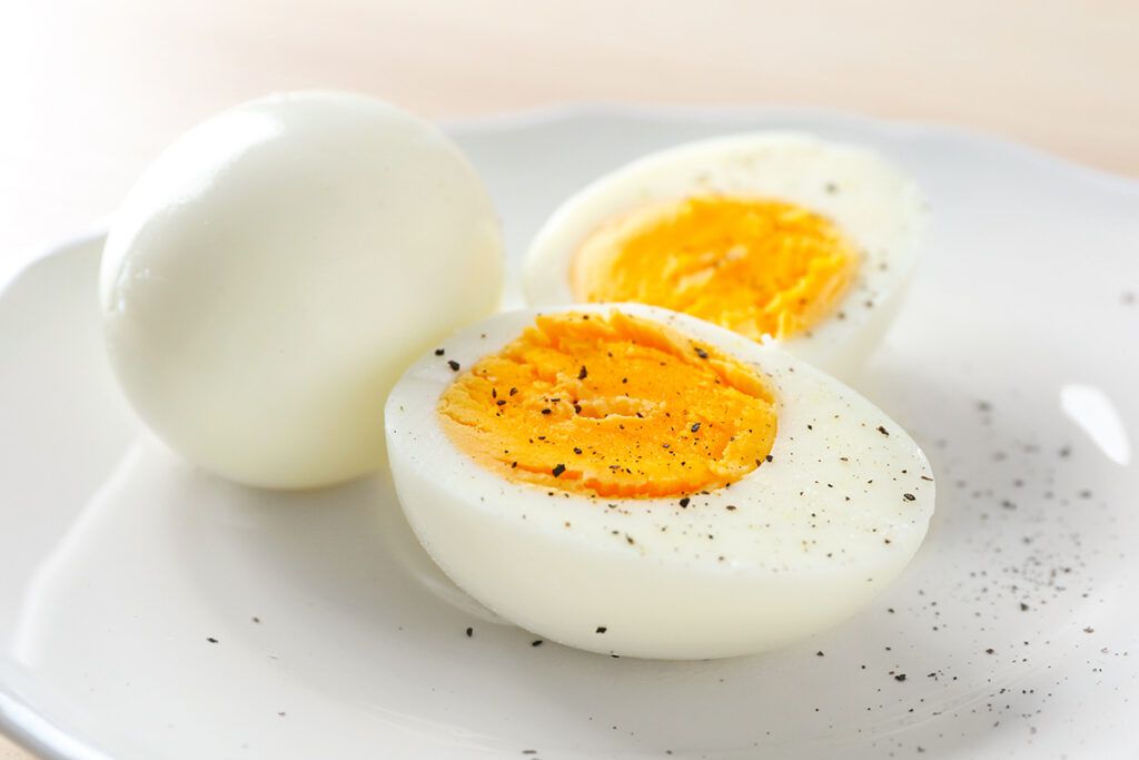 Eggs with pepper on a plate