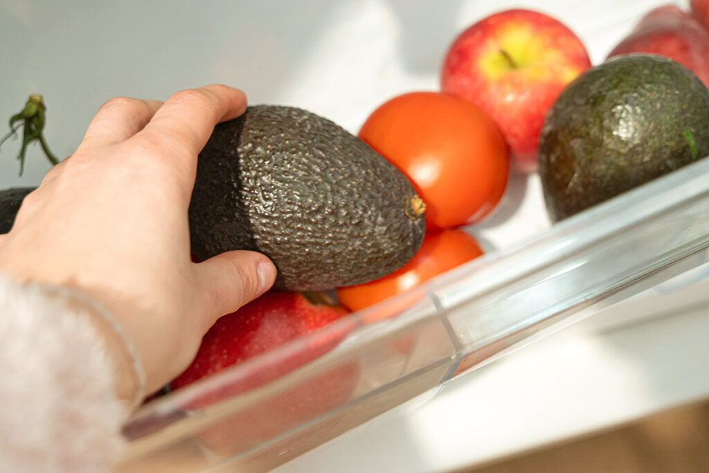 Whole avocado in fridge