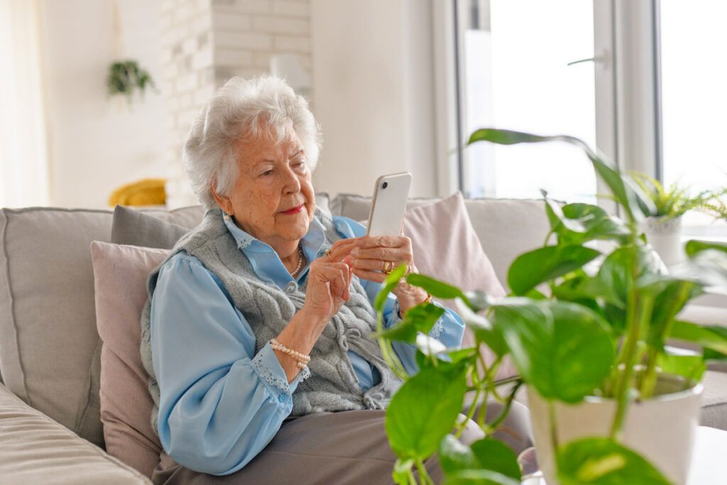 Senior woman looking at phone