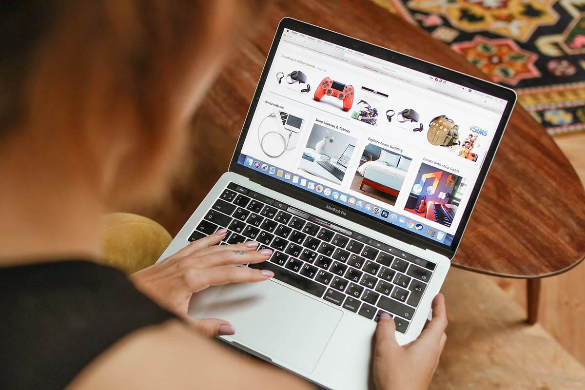 Person shopping on Amazon on laptop