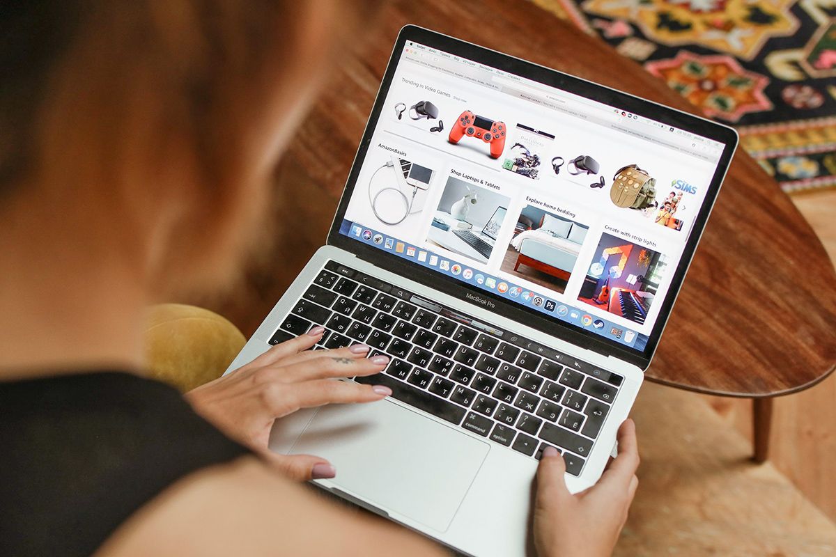 Person shopping on Amazon on laptop