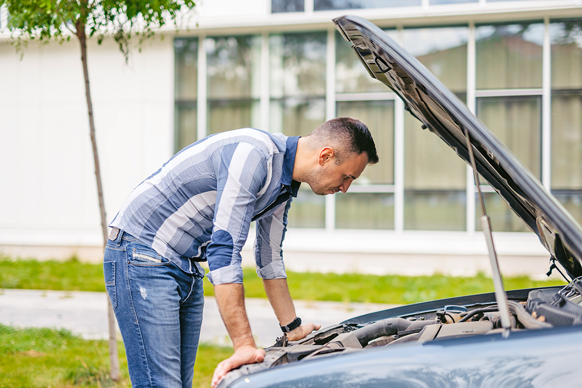 Man looking at engine