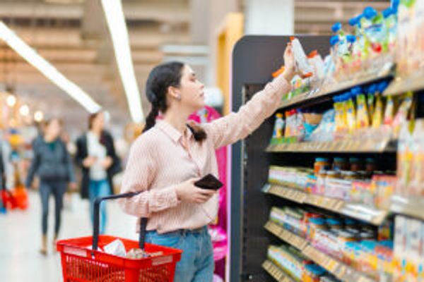 Woman shopping in grocery store