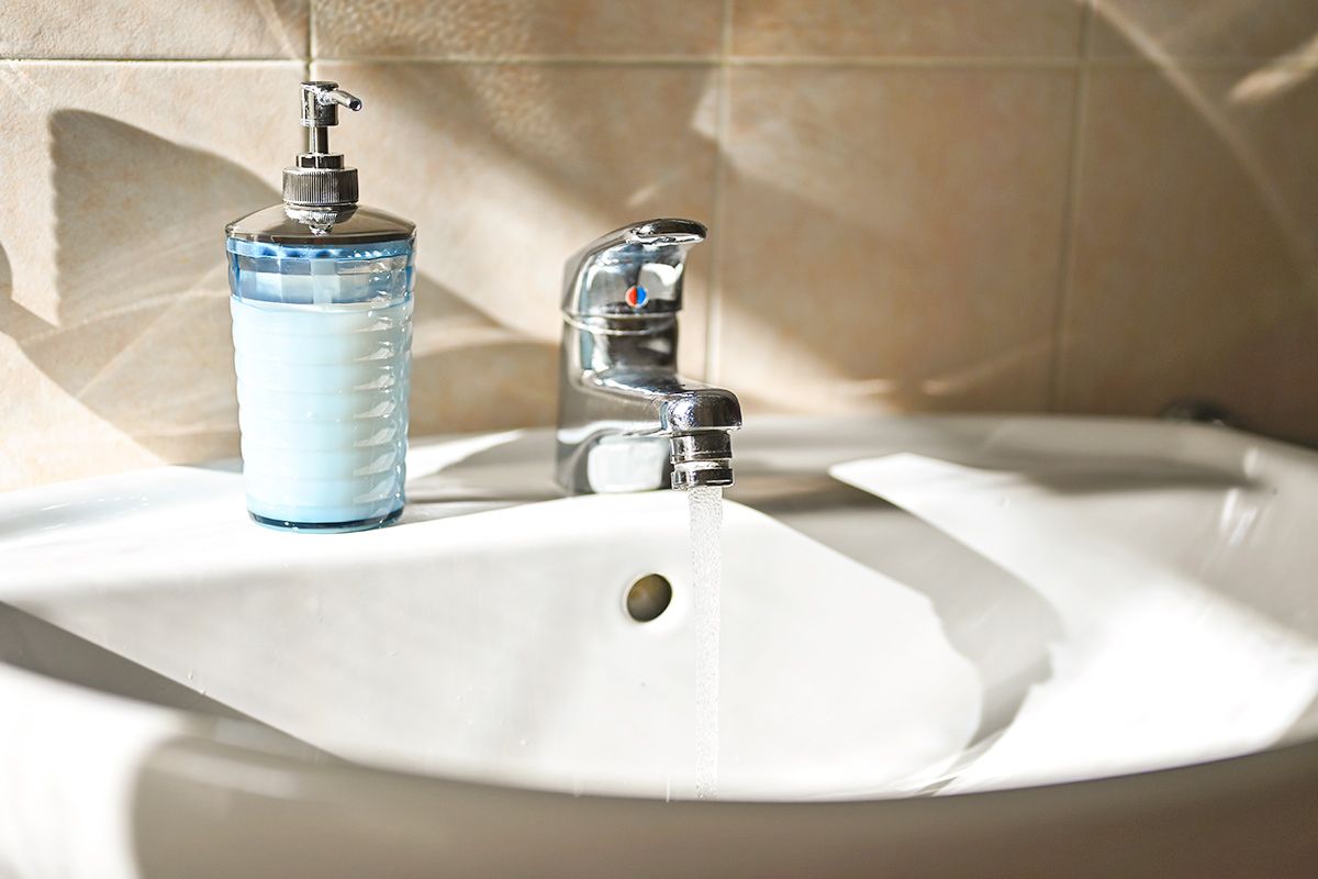 Sink with water running