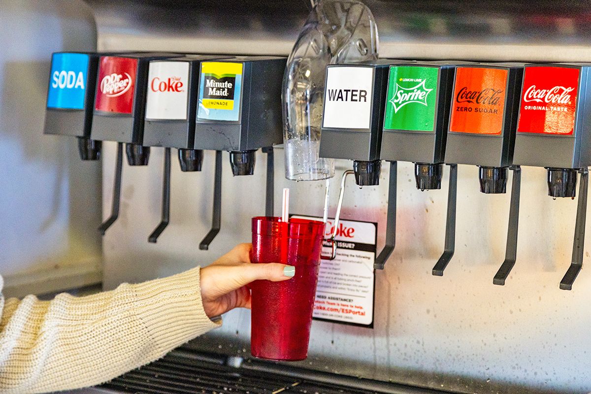 Person getting ice for fountain soda