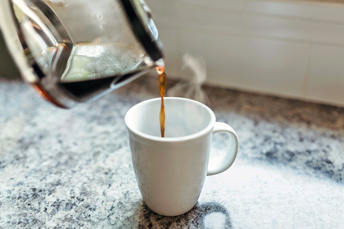 Pouring coffee into cup
