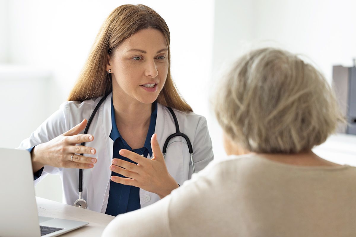 Doctor speaking with patient