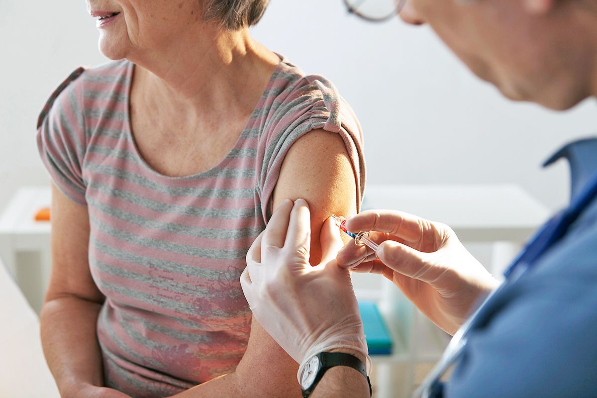 Woman getting vaccine