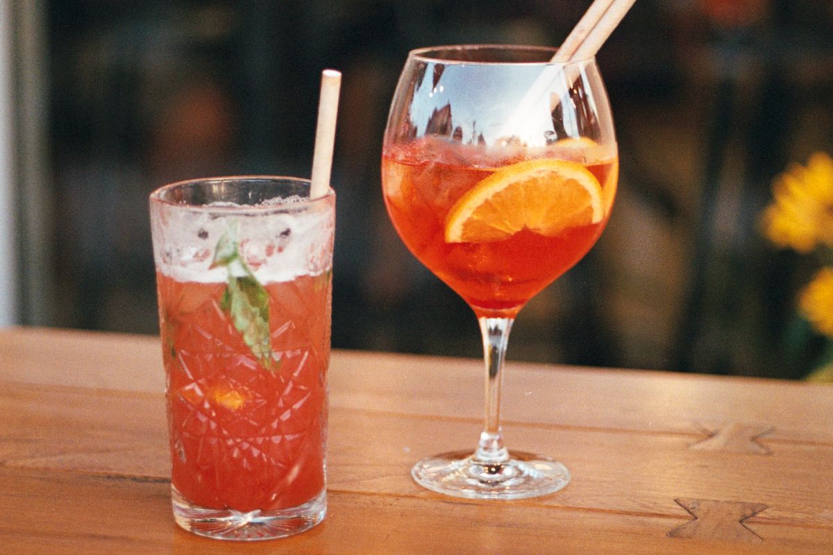 Two cocktails on a table