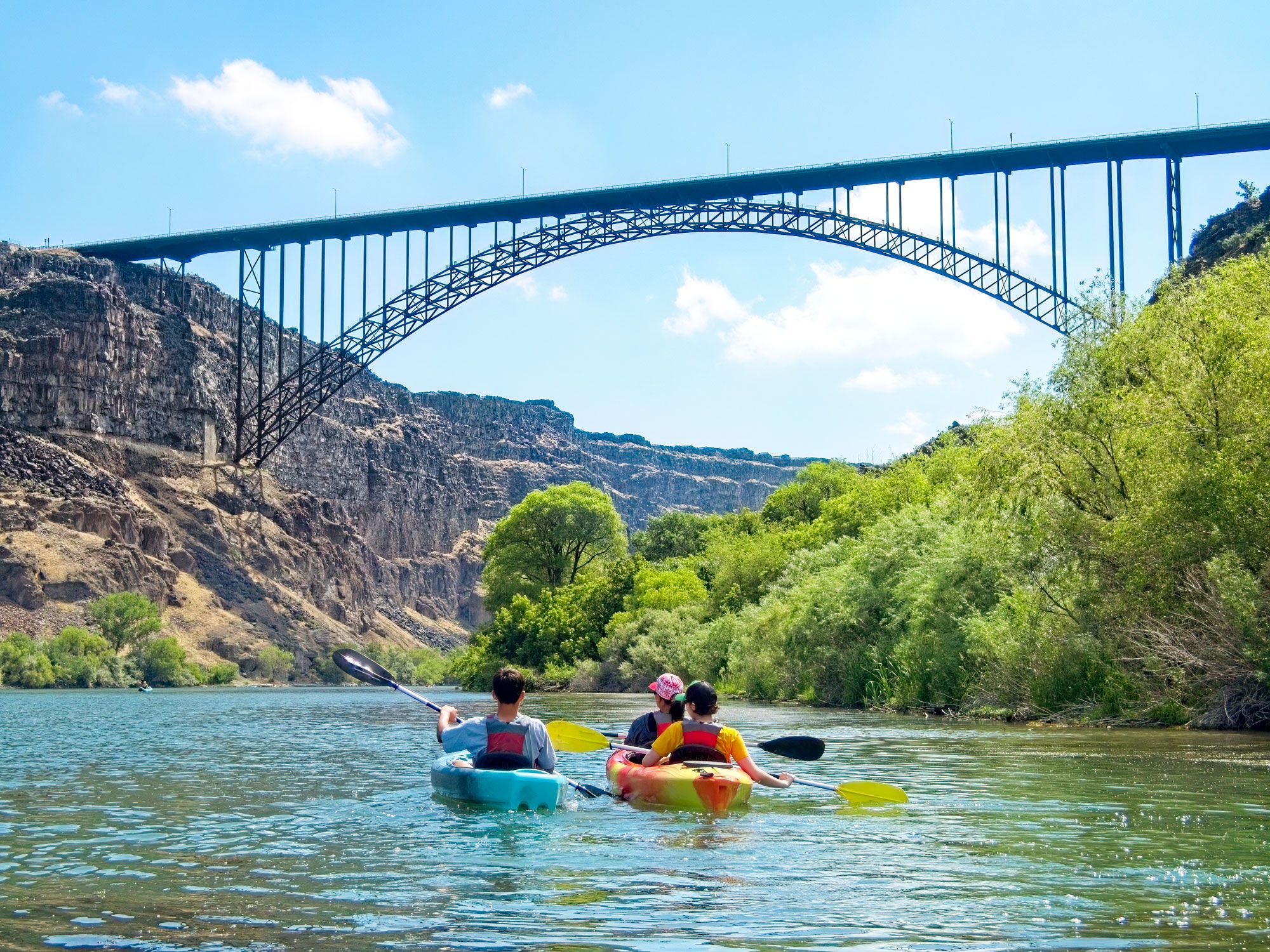 Family kayaking on the Snake River in Idaho