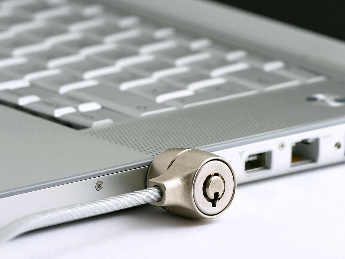 Lock secured to laptop computer