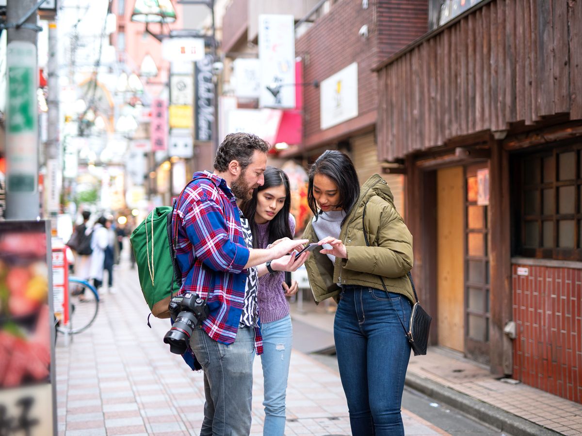 Tourists looking at phone