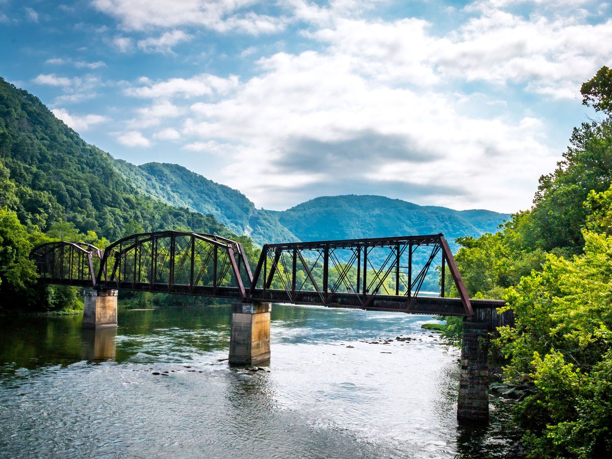 Railroad bridge over river in West Virginia