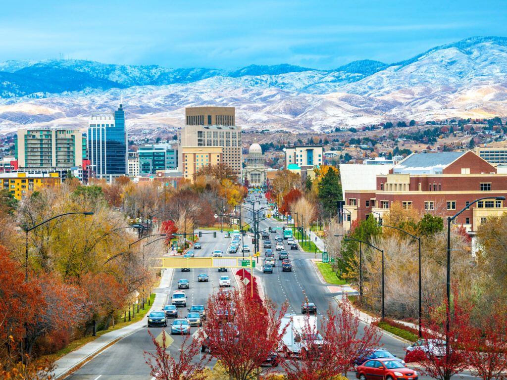 Cityscape of Boise, Idaho, with mountains behind