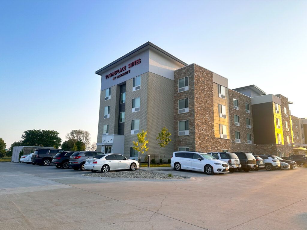 Cars parked outside of hotel