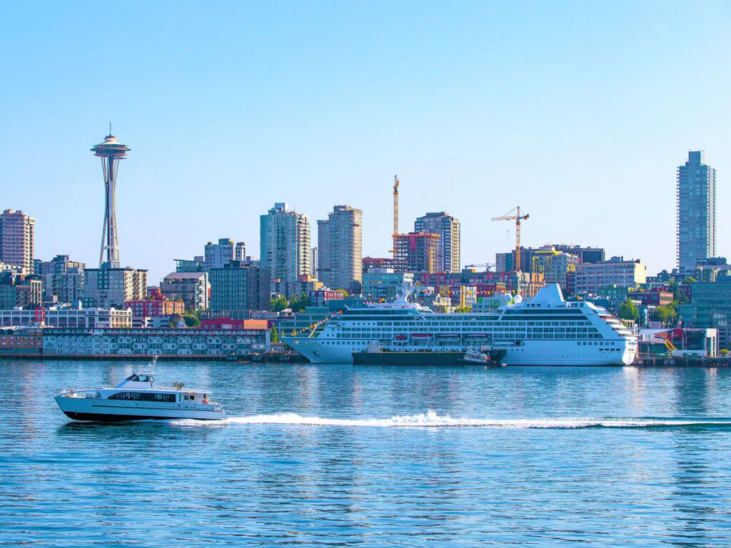 Boats on Puget Sound beside Seattle skyline