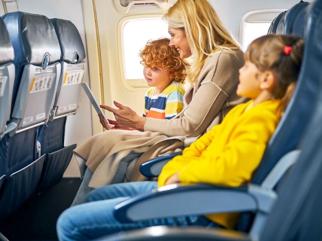 Family seated together on plane