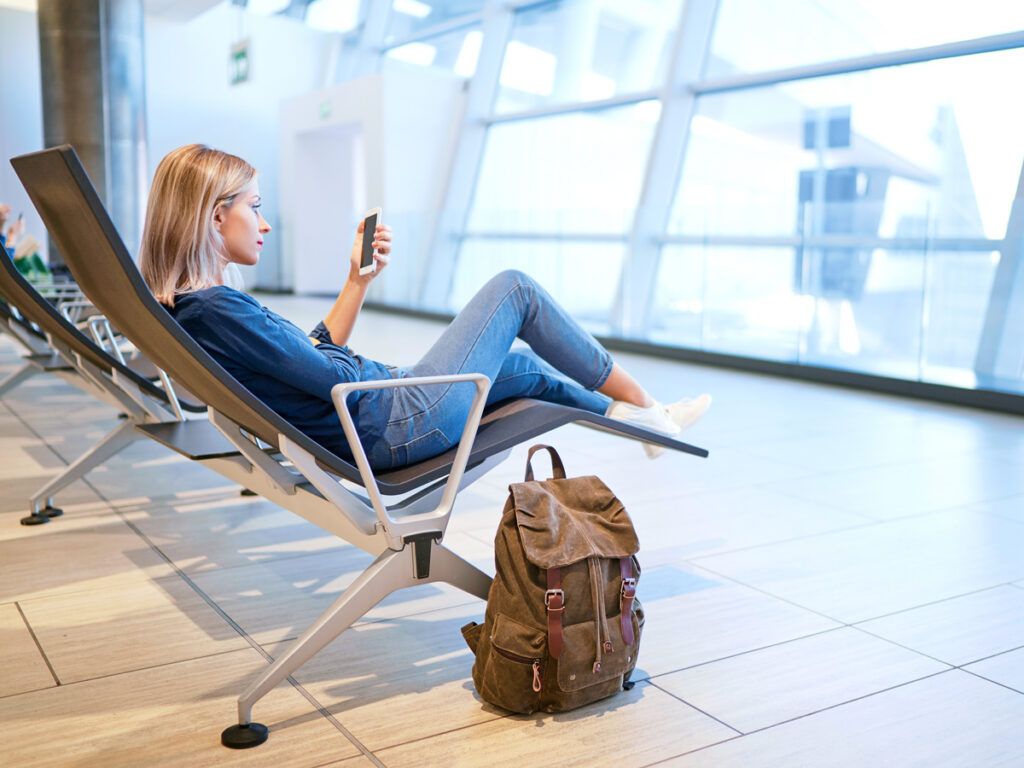 Traveler relaxing in airport terminal