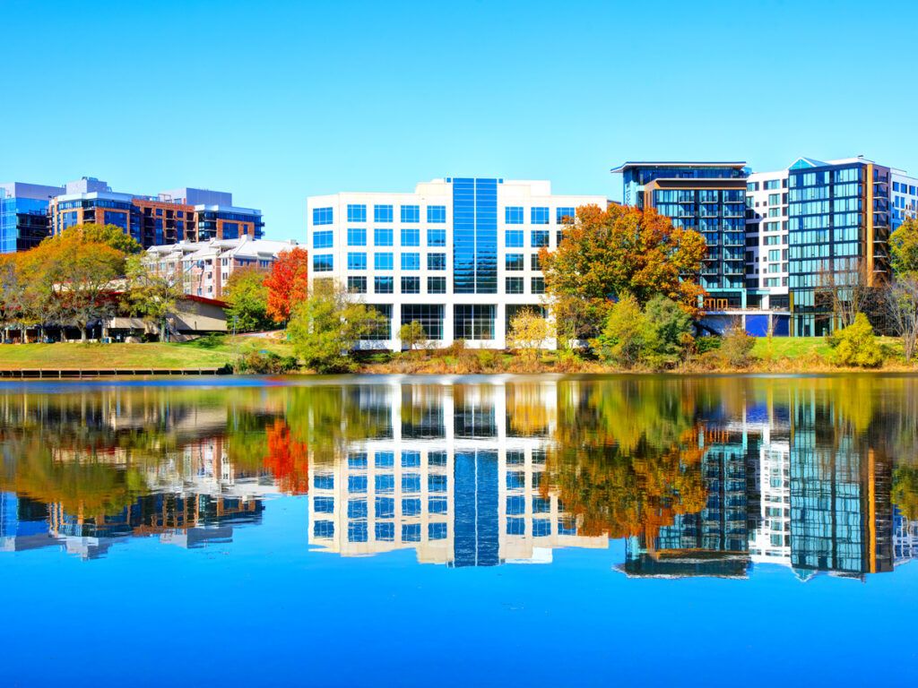Buildings reflected on lake in Columbia, Maryland