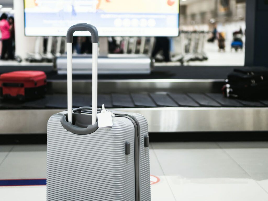 Roller luggage next to baggage claim