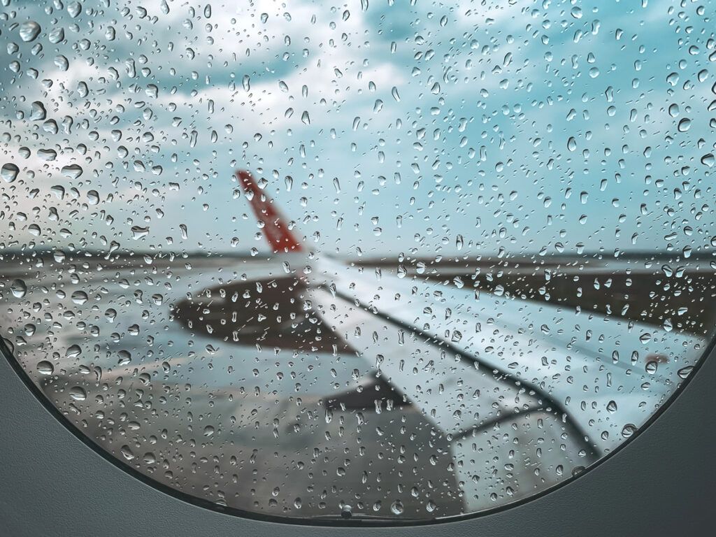 Raindrops on airplane window
