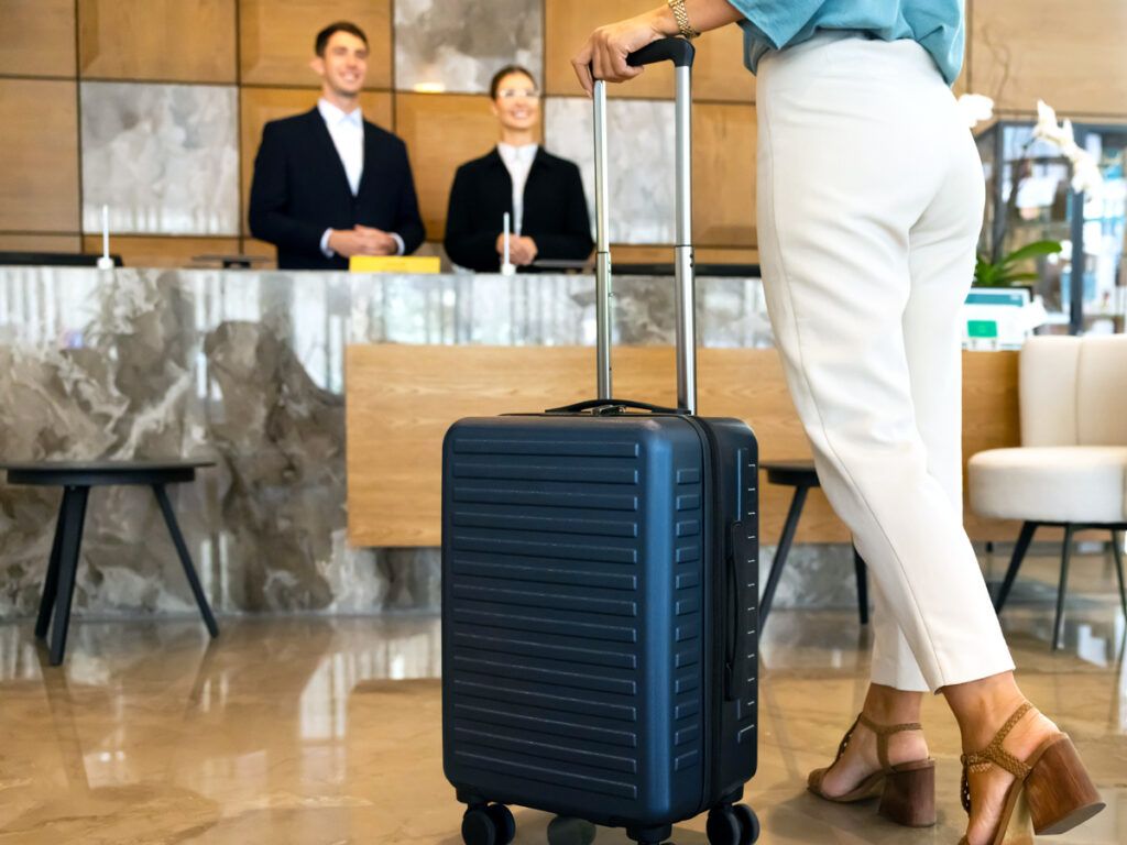 Guest checking in at hotel lobby