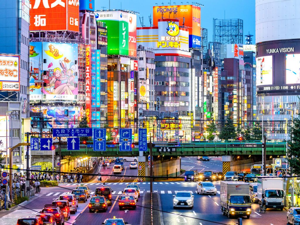 Brightly lit neon signs on Tokyo skyscrapers
