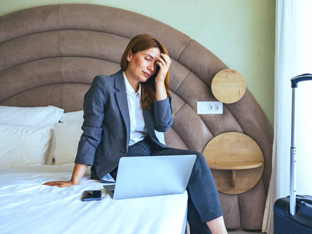 Businesswoman stressed during business trip