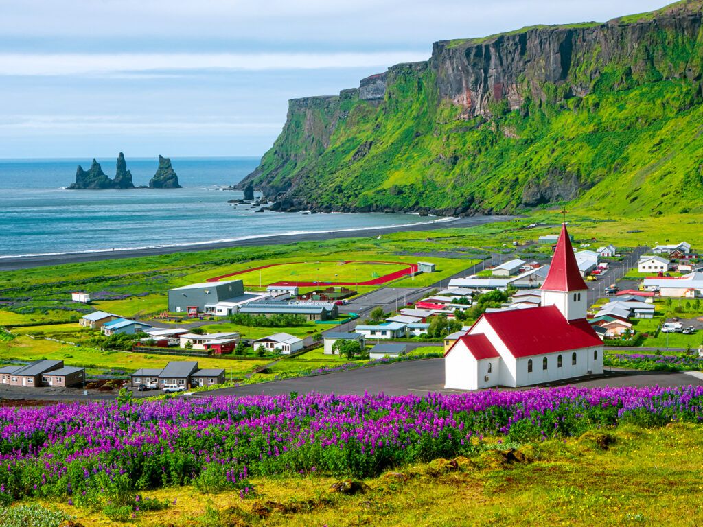 The village Vík í Mýrdal in southern Iceland near the black-sand shore of Reynisfjara