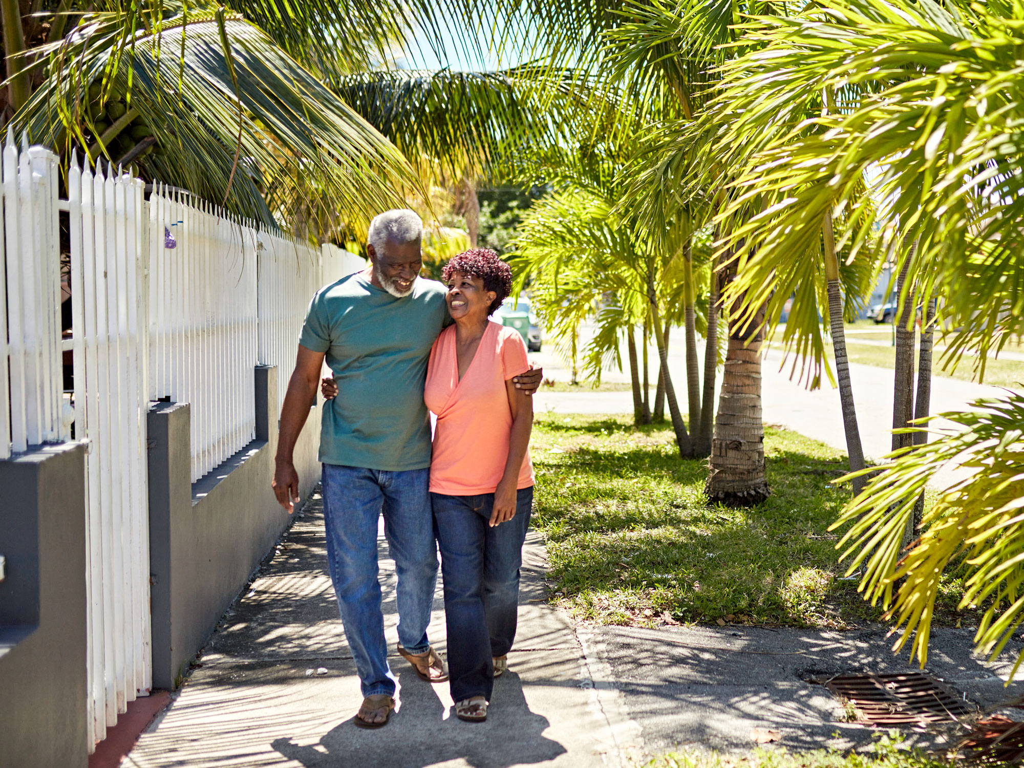 Senior couple walking together in Miami