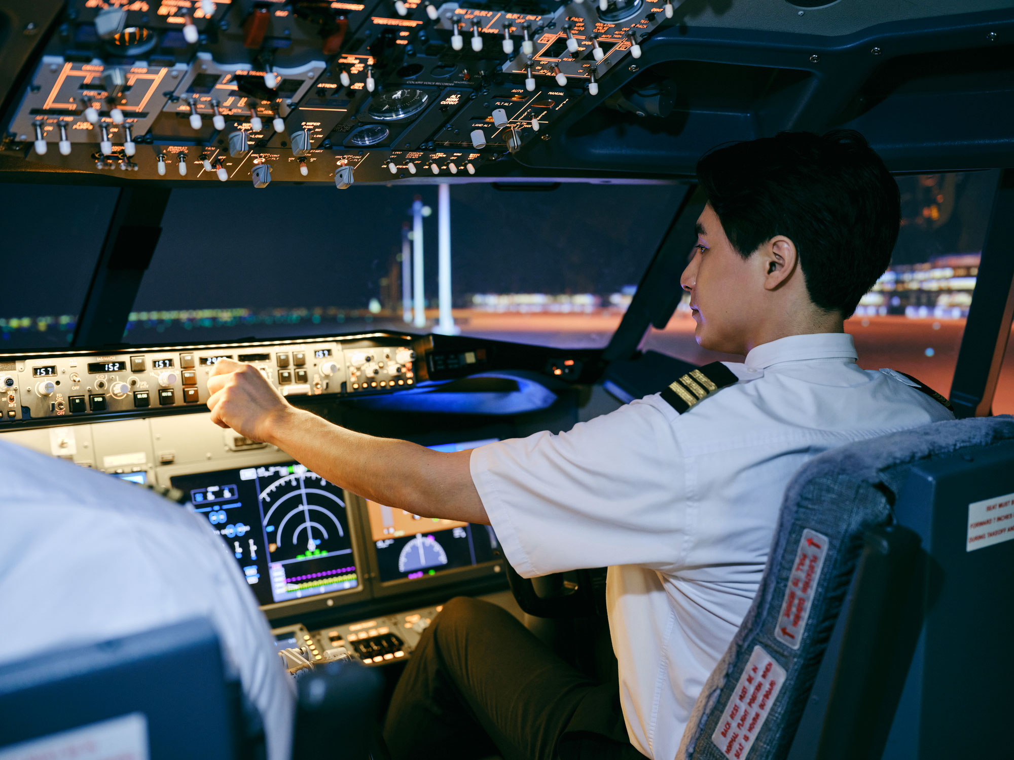 Commercial airline pilot in the cockpit