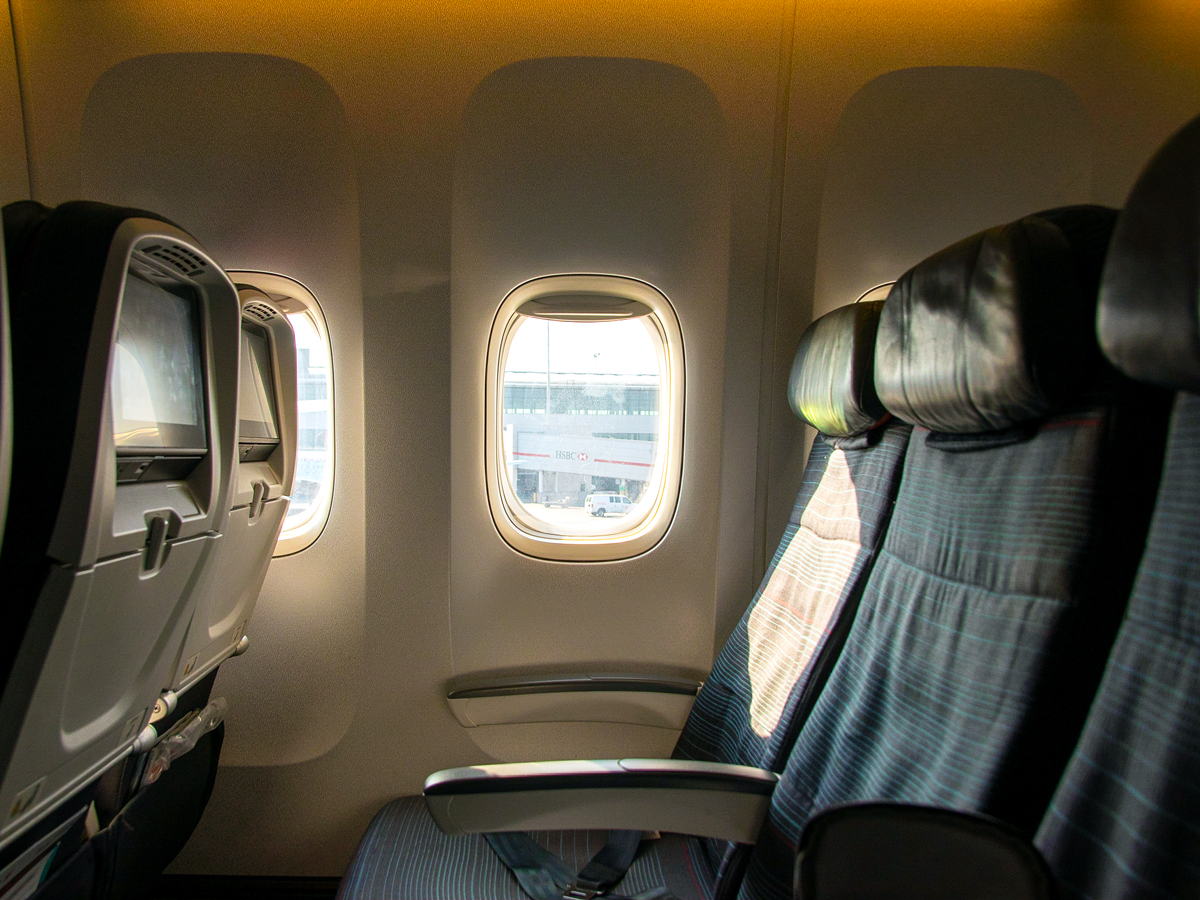 Row of empty airplane seats
