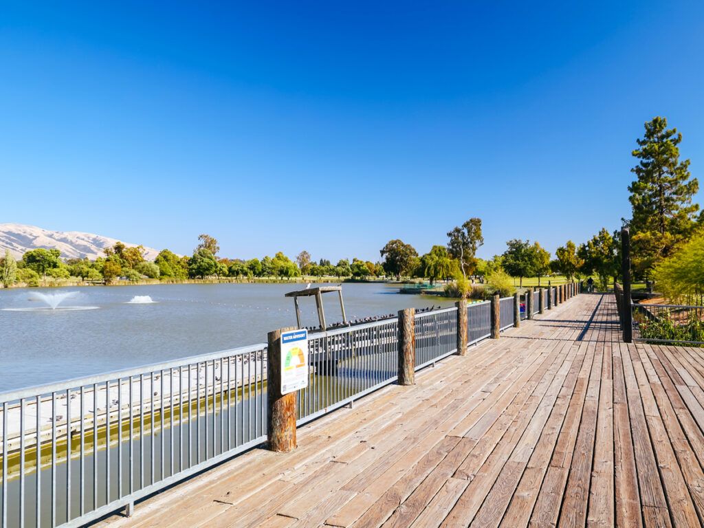 Wooden boardwalk across Lake Elizabeth in Fremont, California