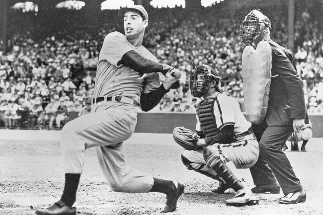 Joe DiMaggio swinging
