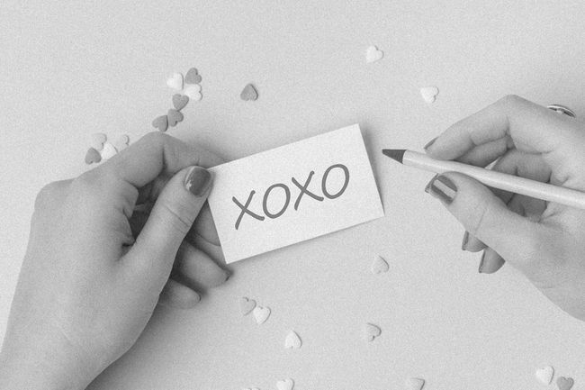 “XOXO” on note card
