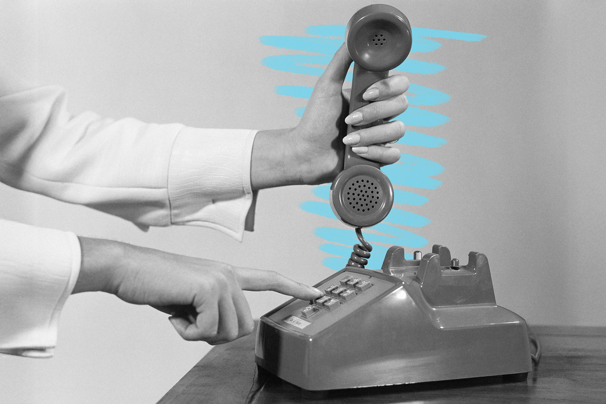 Woman dialing phone