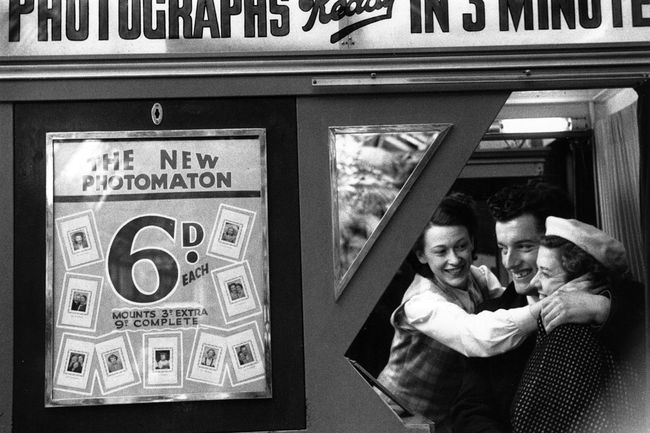 Friends in a photo booth, 1953